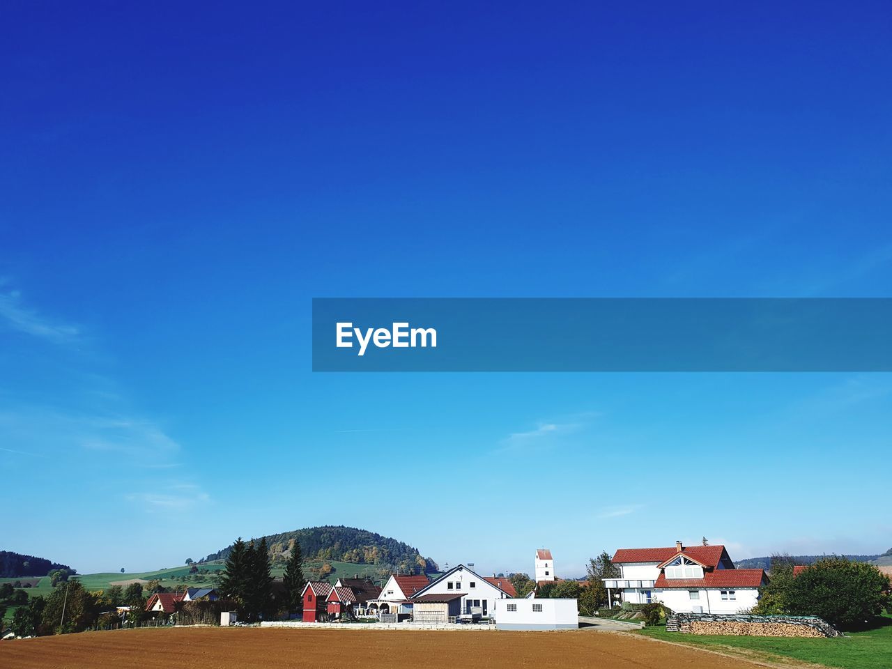 BUILDINGS AGAINST BLUE SKY