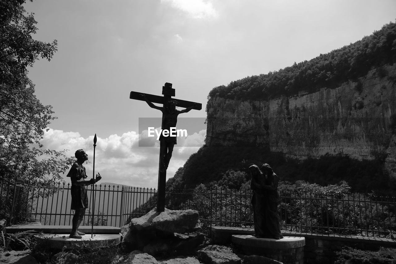 low angle view of man standing on rock