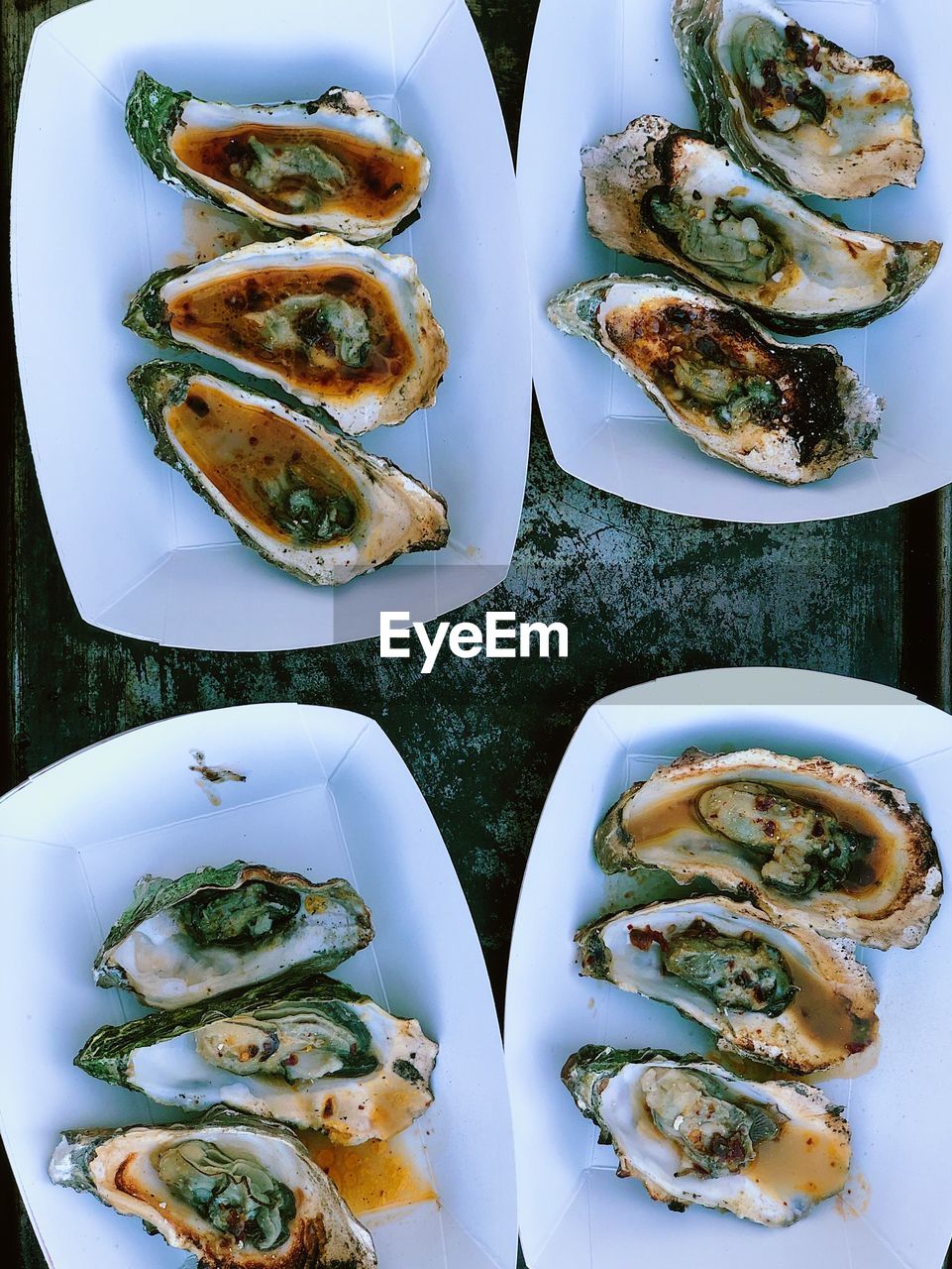 High angle view of oysters on table