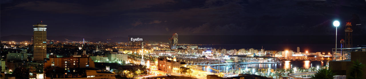 VIEW OF ILLUMINATED CITYSCAPE