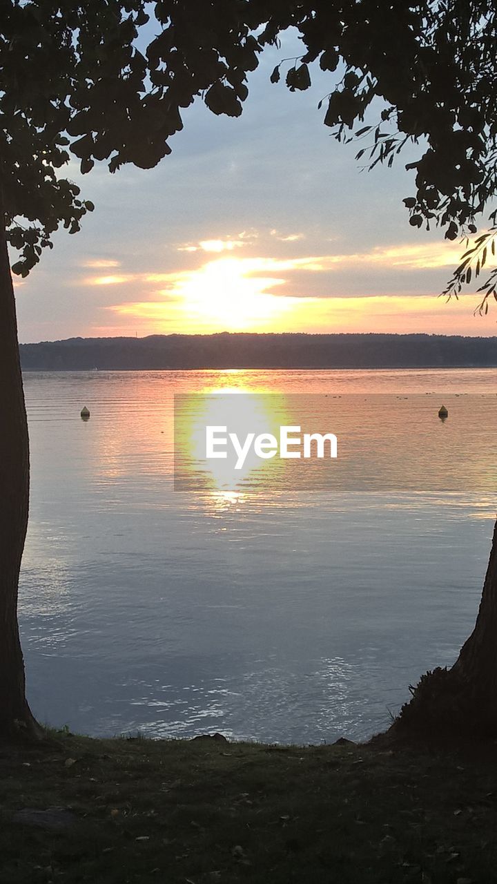 SCENIC VIEW OF SEA DURING SUNSET