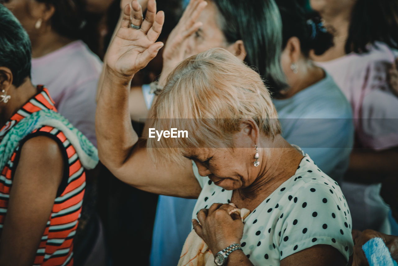 People praying in church