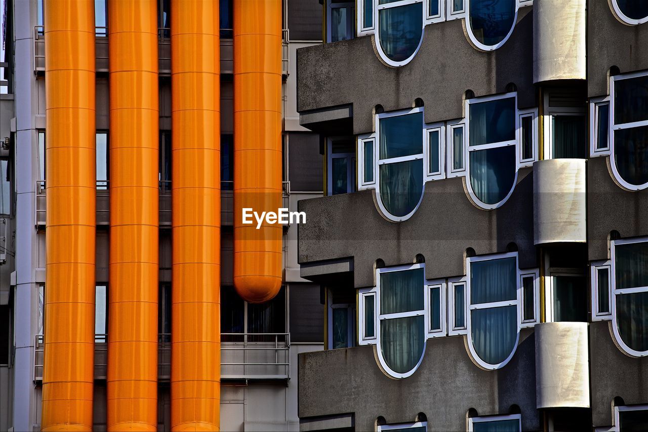 Orange pipes on residential building