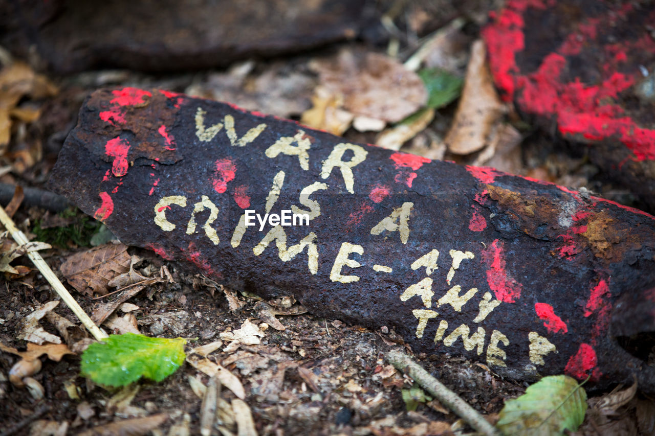 High angle view of text on wood