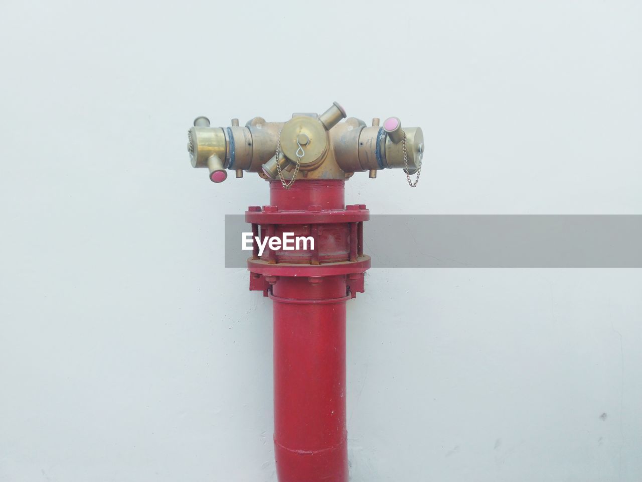 CLOSE-UP OF RED FIRE HYDRANT