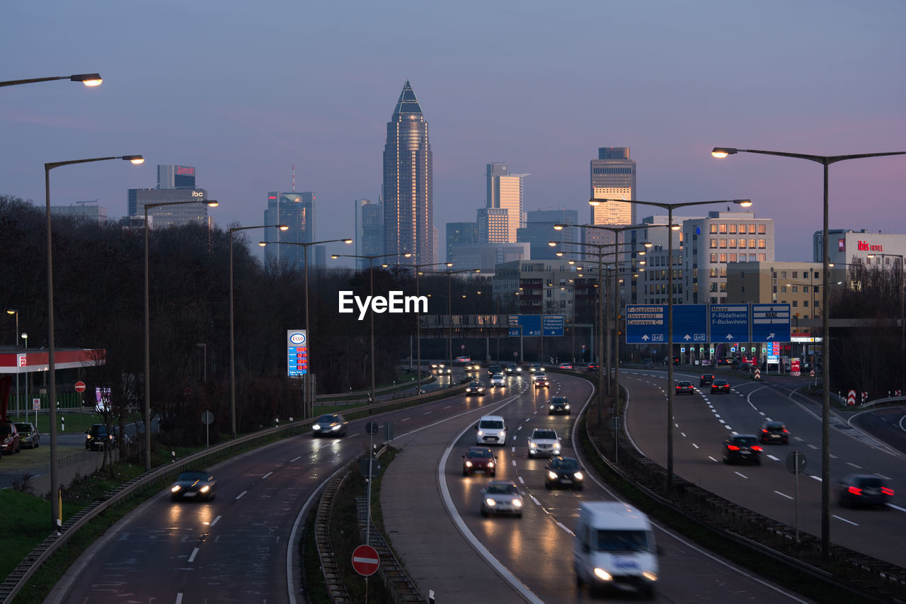 High angle view of vehicles on multiple lane highway at dusk