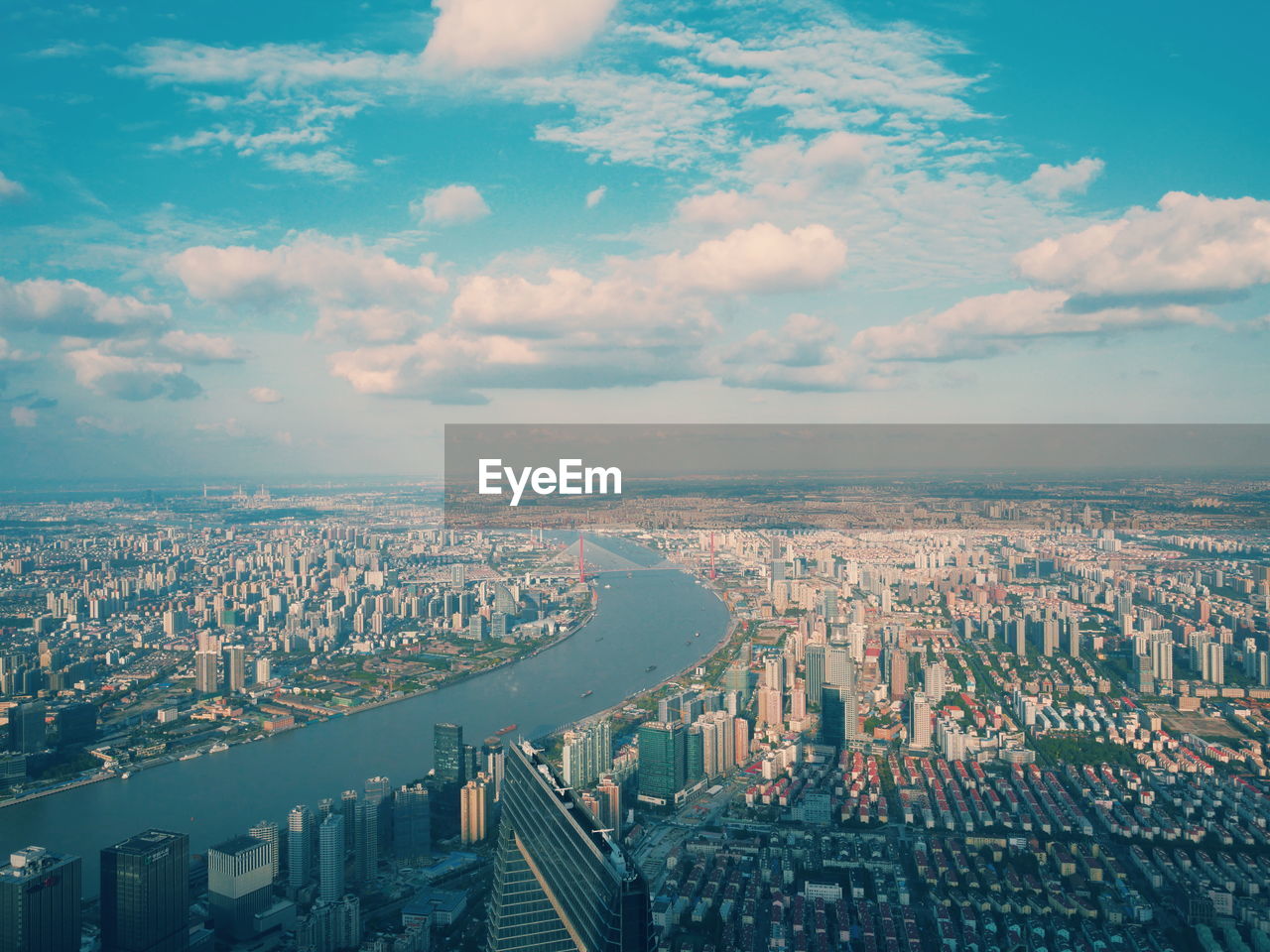 High angle view of buildings in city against sky