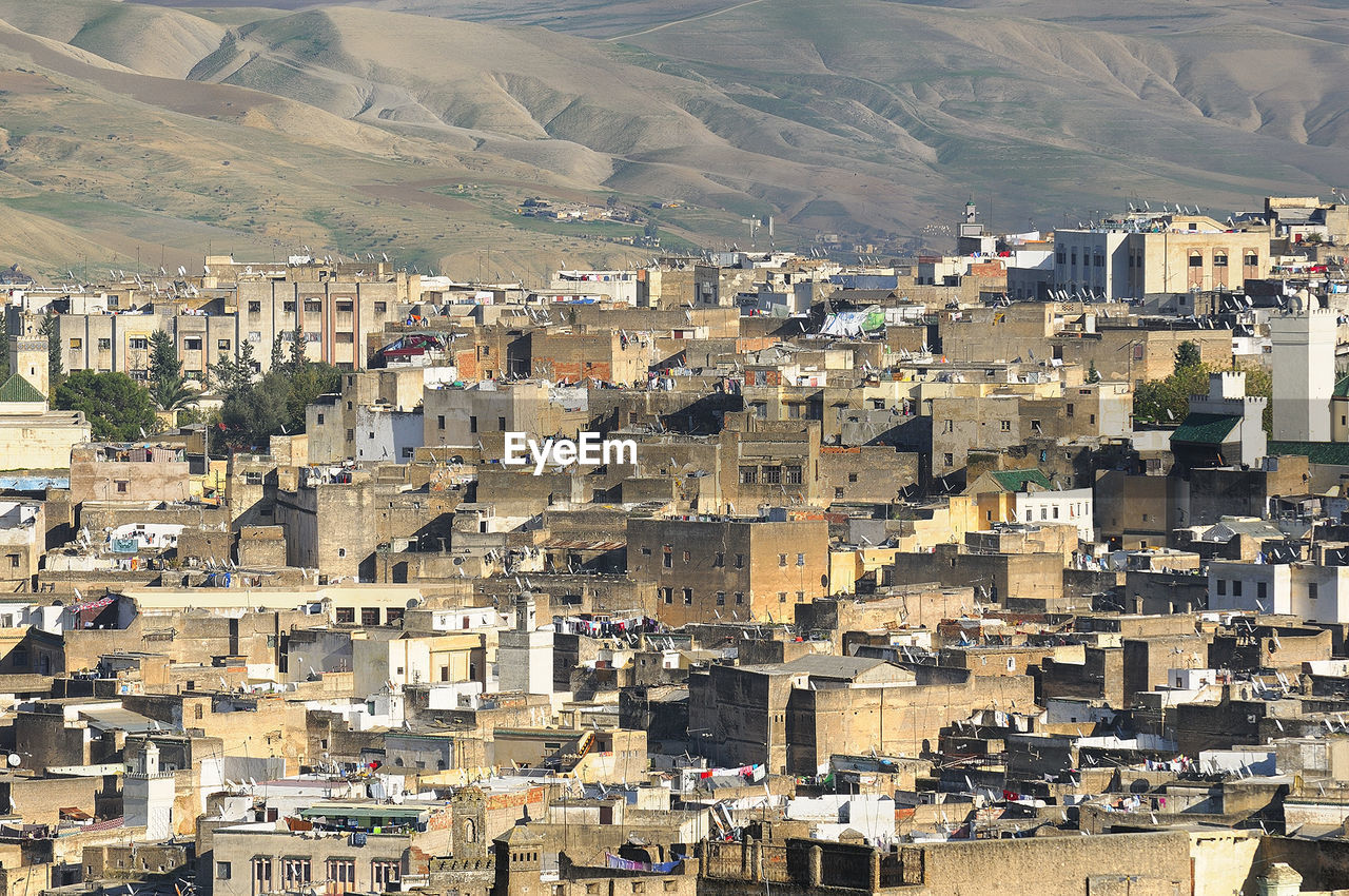 High angle view of houses in city