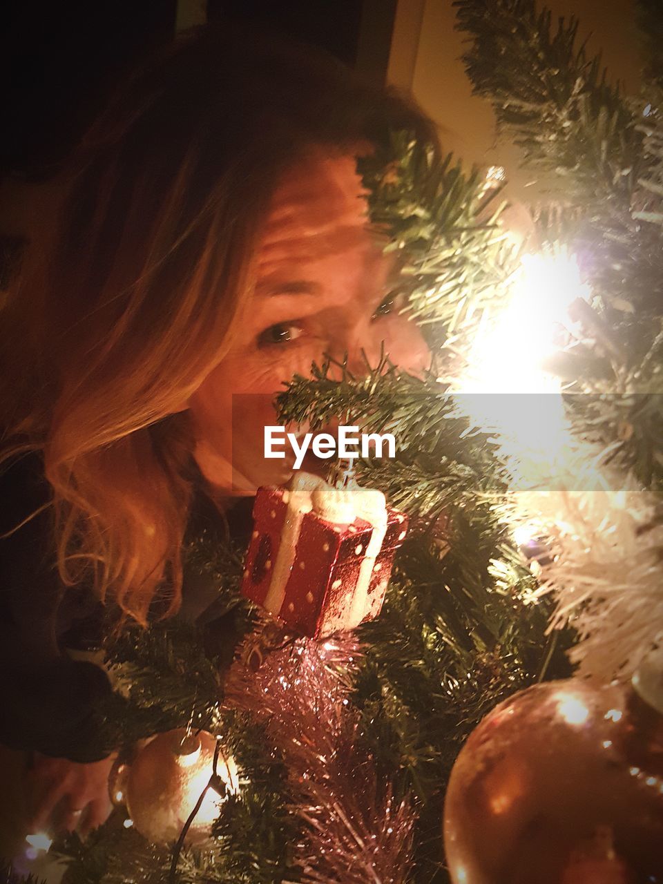 CLOSE-UP OF CHRISTMAS TREE AGAINST STAR SHAPE
