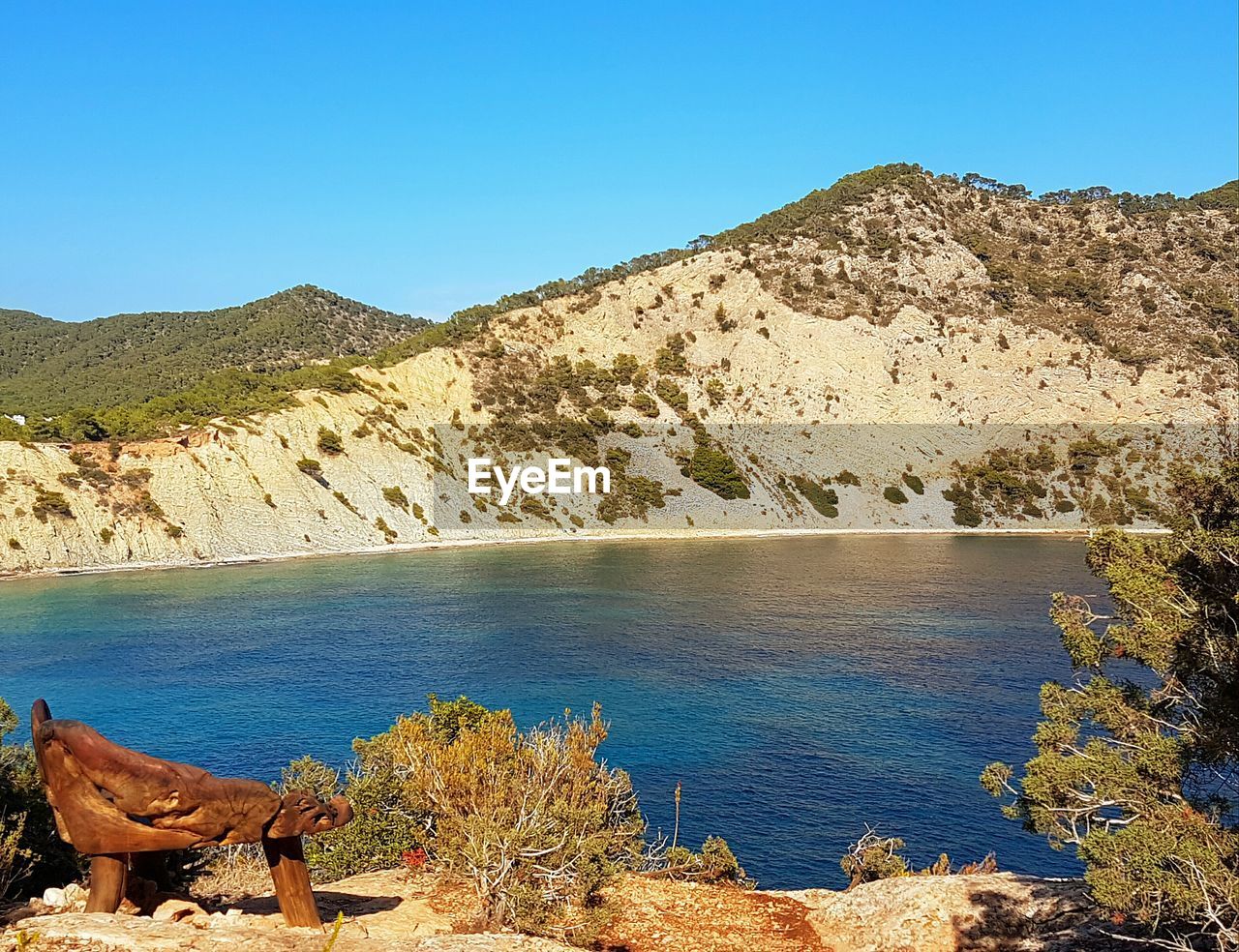 VIEW OF CALM SEA AGAINST CLEAR SKY