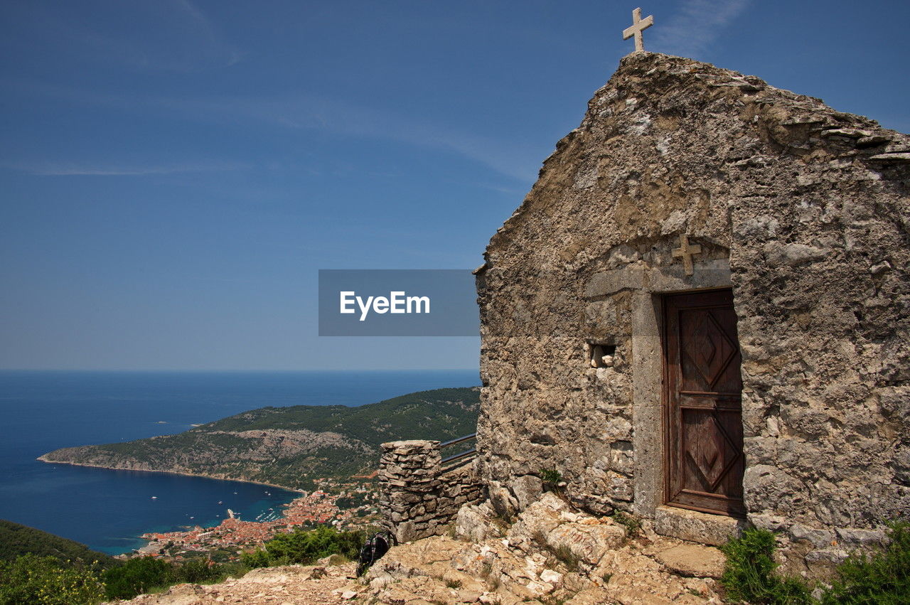 Small medieval stone church on the top of the hill with beautiful view on adriatic coast