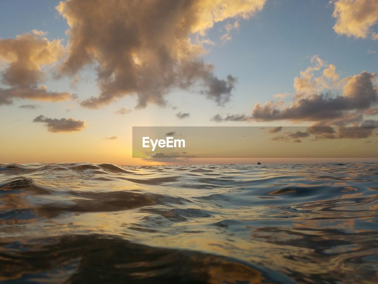 Scenic view of sea against sky at sunset