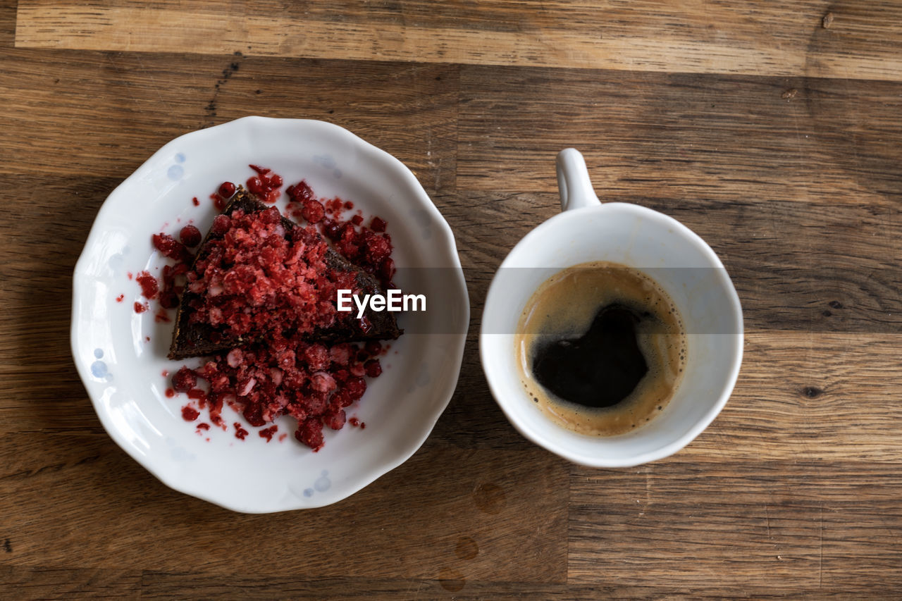 food and drink, wood, food, drink, table, freshness, produce, cup, high angle view, directly above, indoors, healthy eating, mug, wellbeing, refreshment, no people, breakfast, coffee, berry, crockery, eating utensil, meal, fruit, coffee cup, kitchen utensil, spoon, still life