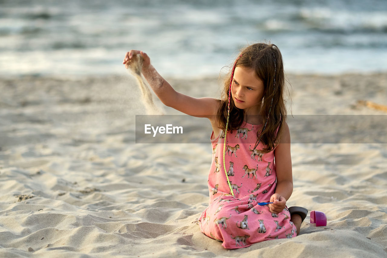 Full length of girl on beach