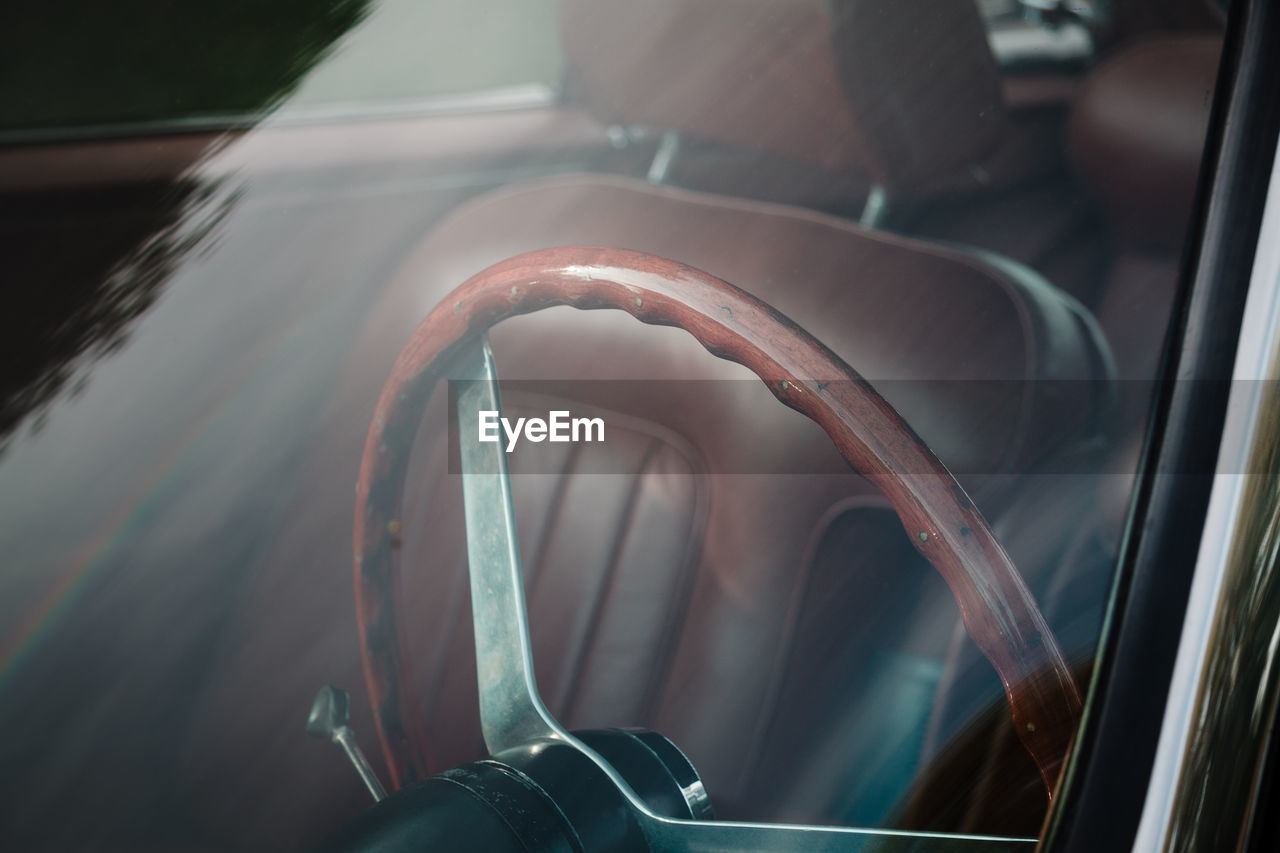 Close-up of steering wheel in vintage car