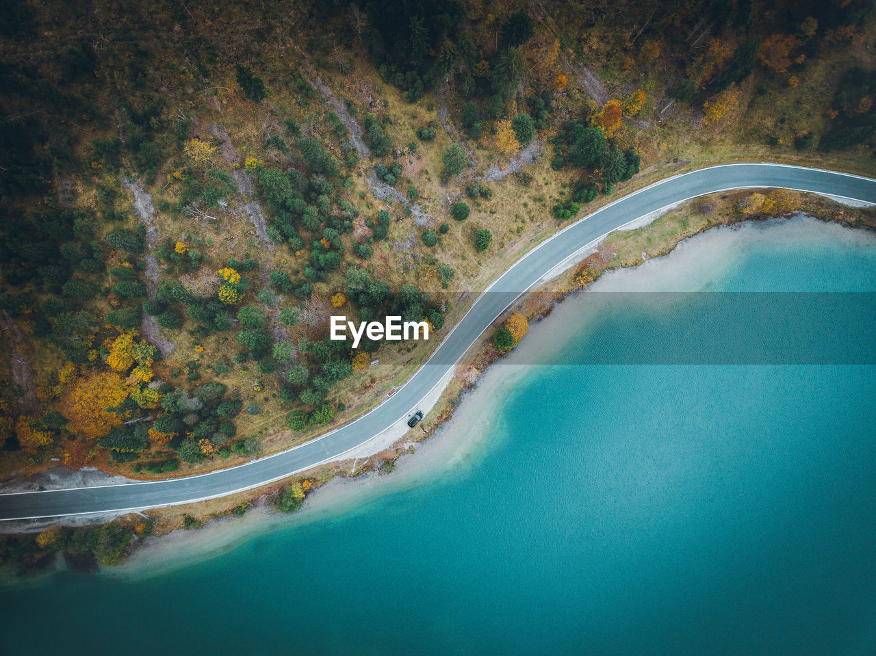 High angle view of road by lake