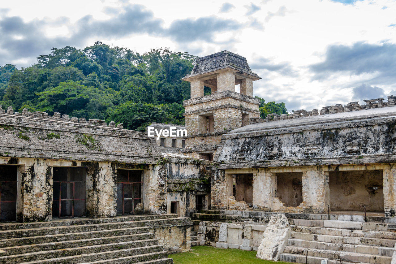architecture, ruins, built structure, history, the past, archaeological site, building exterior, ancient history, travel destinations, ancient, building, travel, sky, cloud, tourism, old ruin, historic site, nature, religion, old, plant, temple - building, ancient civilization, place of worship, temple, landmark, belief, no people, tree, estate, archaeology, palace, fortification, outdoors, spirituality, stone material, staircase, day, city, tradition, ruined