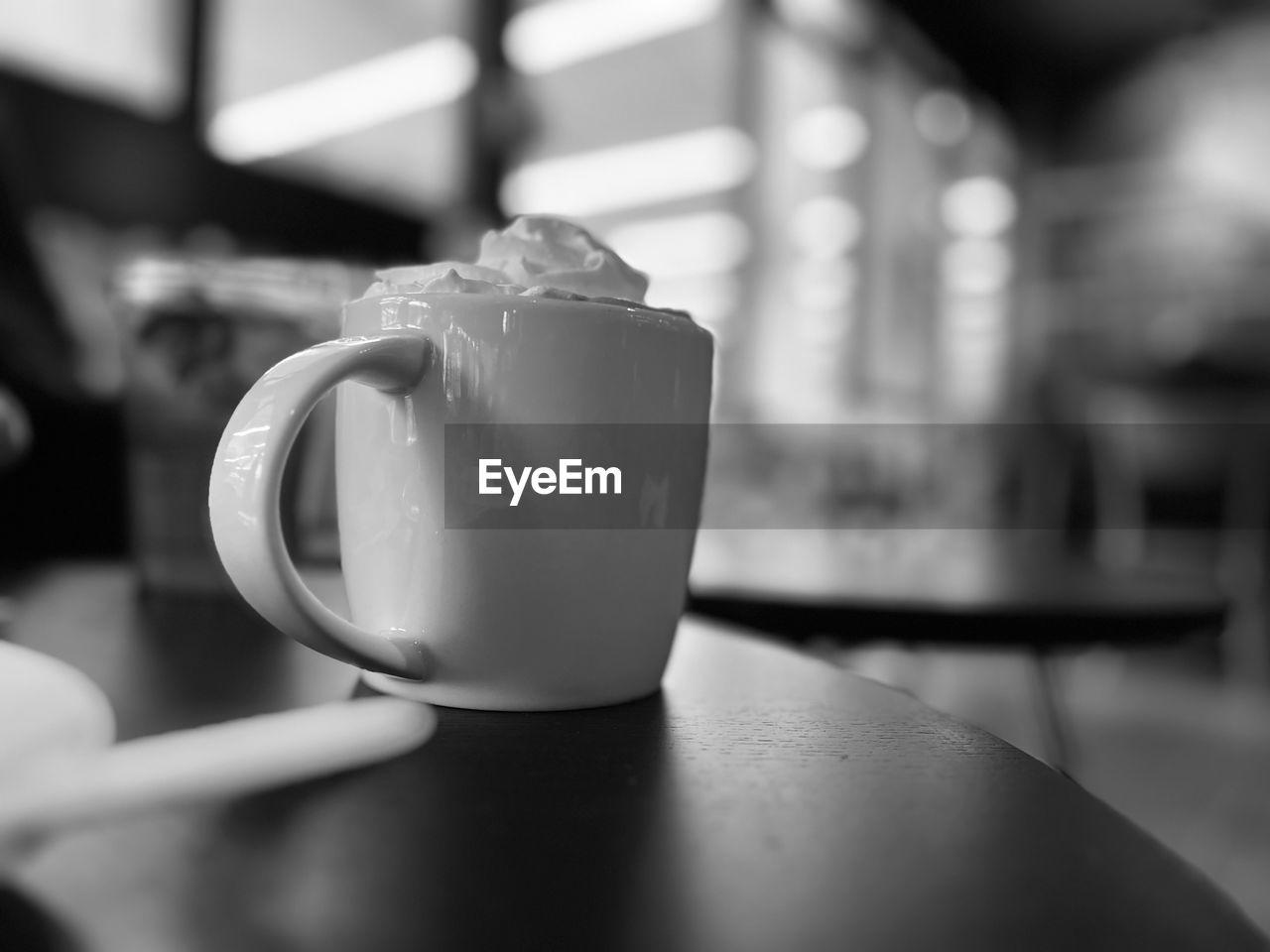 black, white, black and white, monochrome, monochrome photography, food and drink, drink, cup, mug, indoors, focus on foreground, refreshment, close-up, table, tableware, coffee cup, coffee, cafe, hot drink, still life photography, selective focus, freshness, tea cup, still life, food, restaurant, household equipment, no people, business