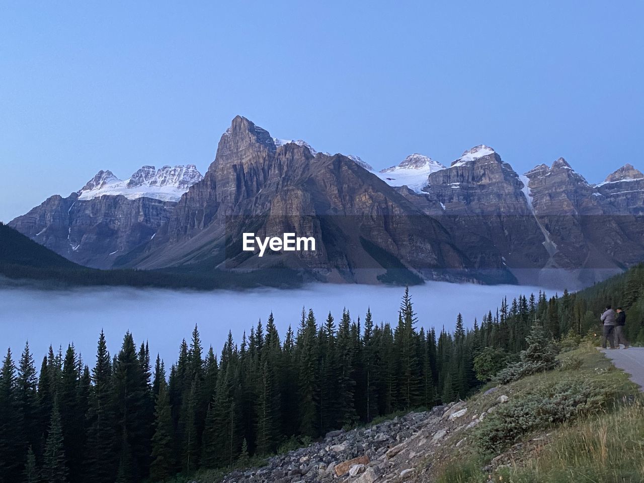 Scenic view of valley of five peaks , alpine lake against clear sky