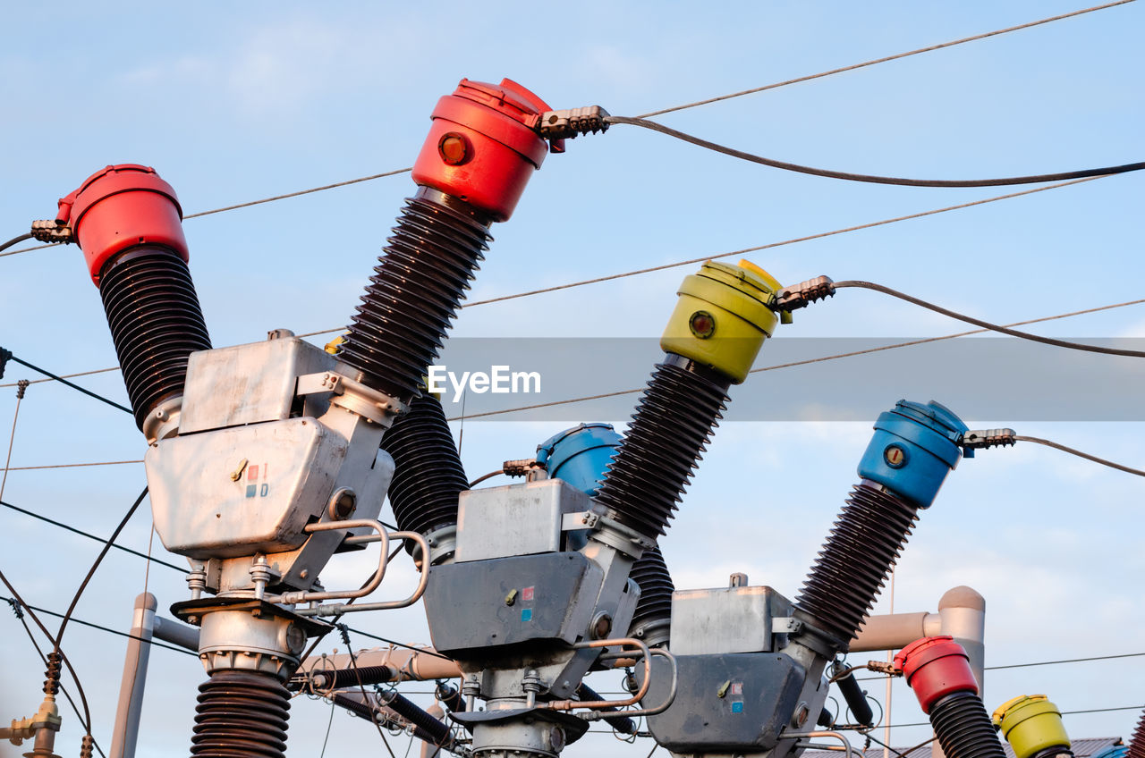 LOW ANGLE VIEW OF CABLES AGAINST SKY