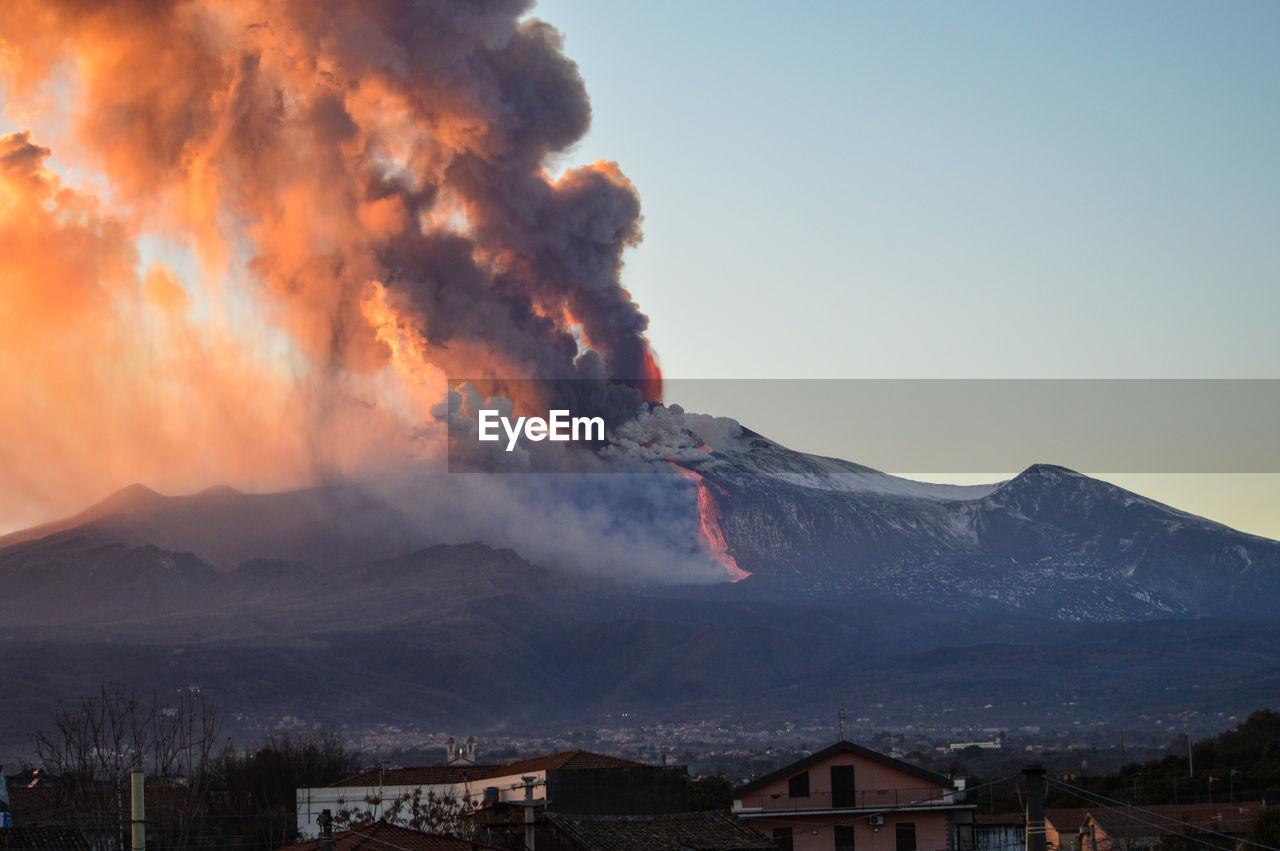 Scenic view of volcanic mountain against sky