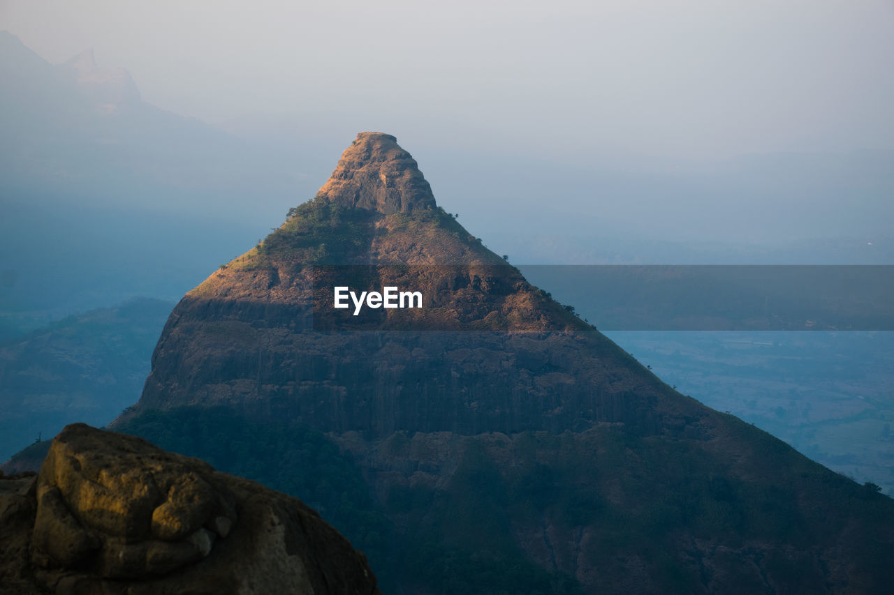 Scenic view of mountain against sky