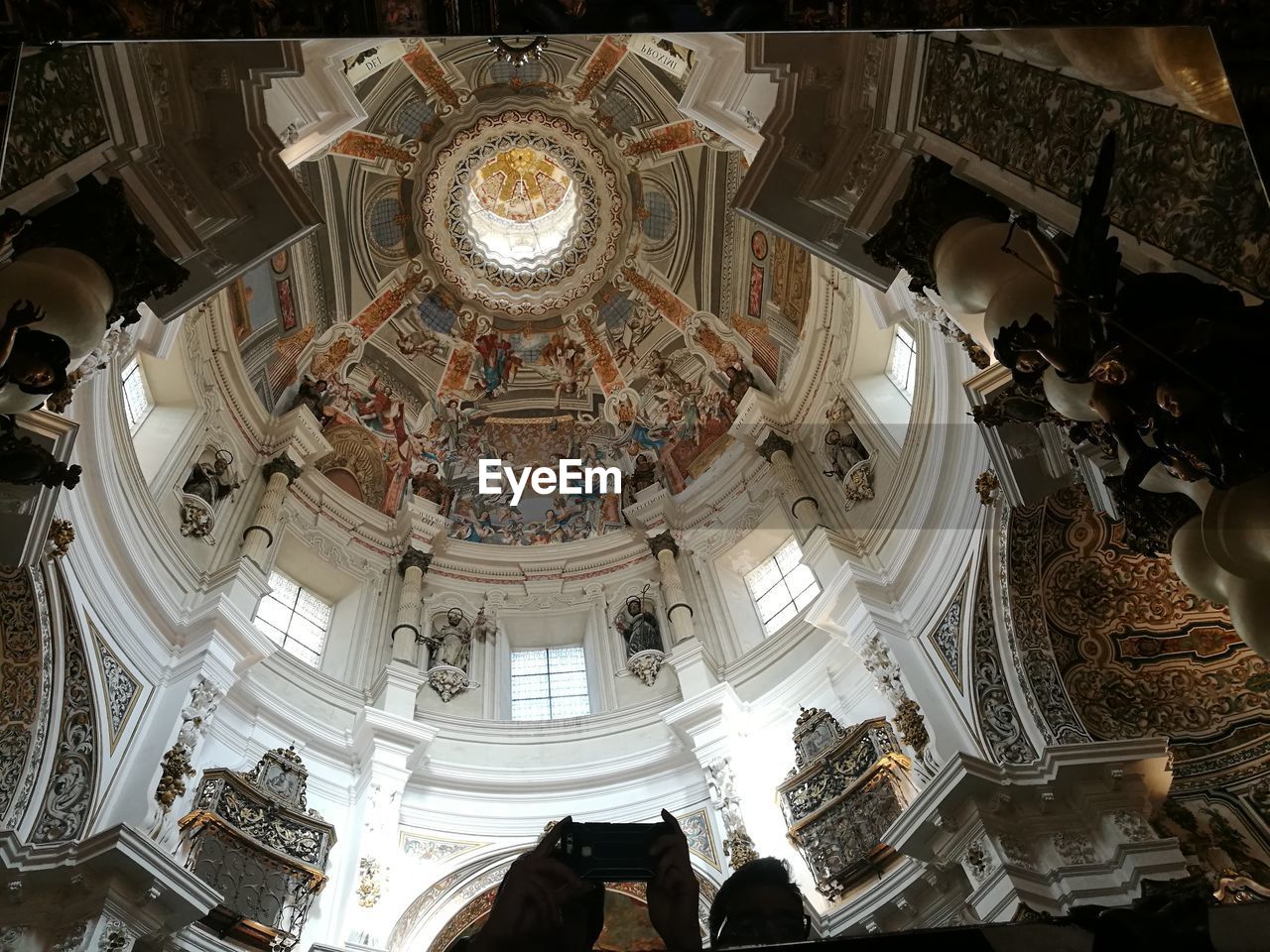 LOW ANGLE VIEW OF CEILING OF HISTORIC BUILDING