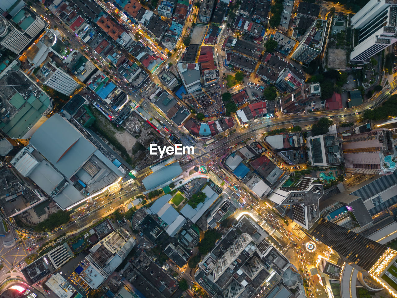 high angle view of illuminated buildings in city