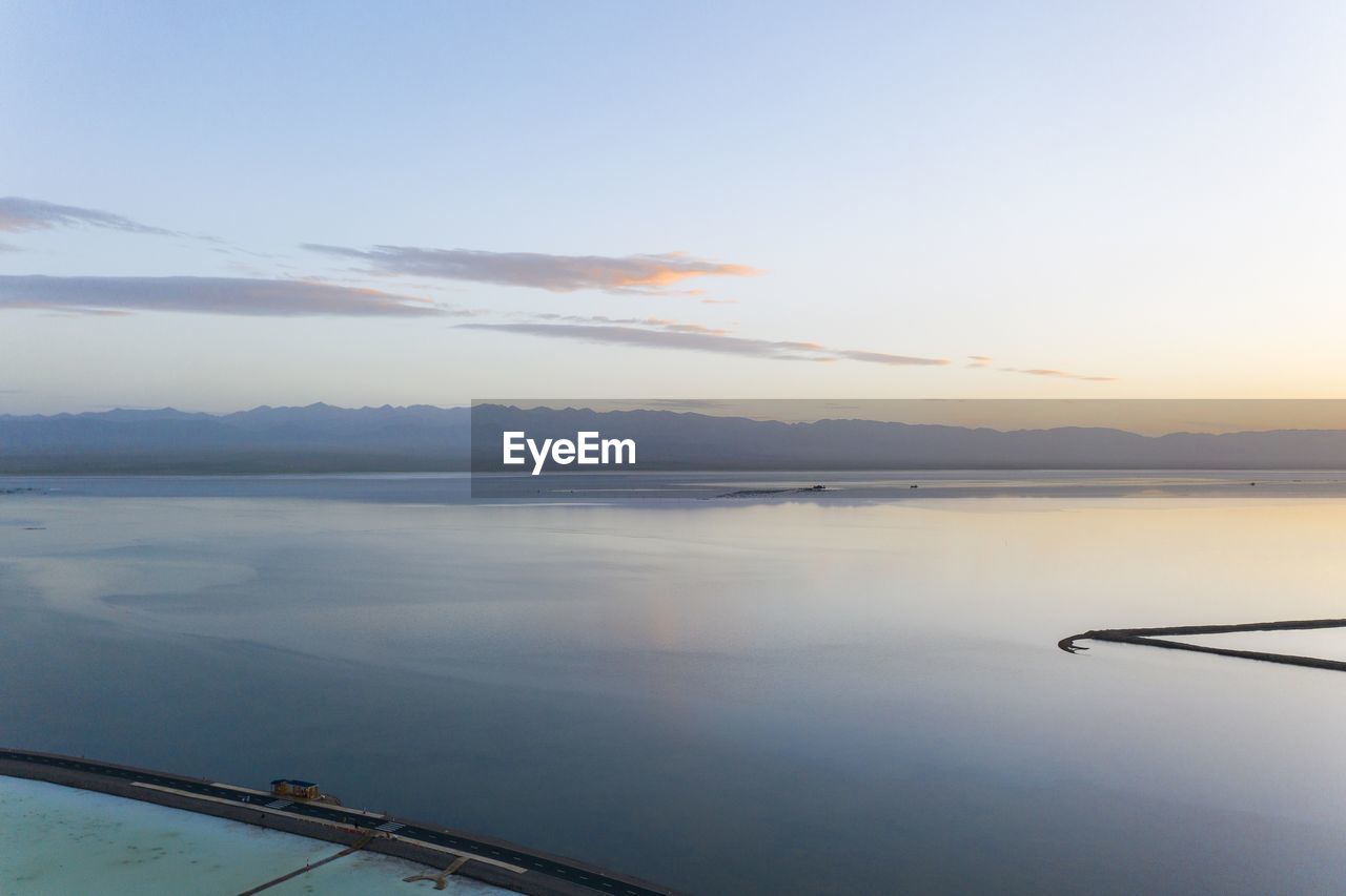 SCENIC VIEW OF SEA DURING SUNSET