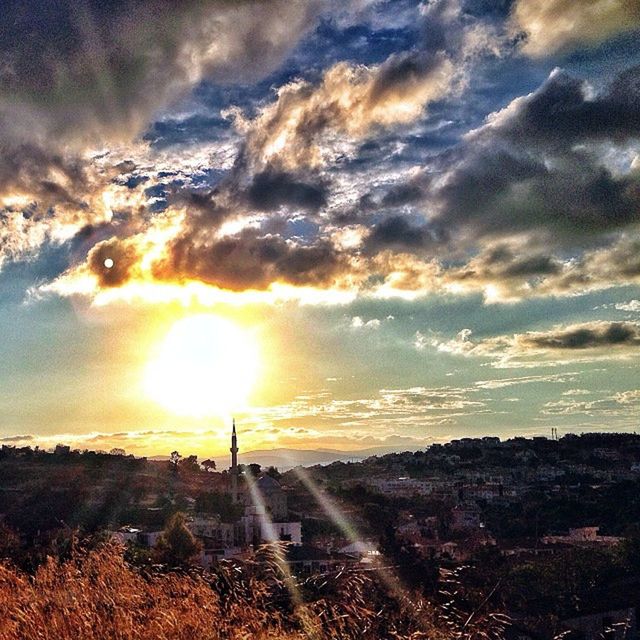 VIEW OF SUNSET OVER CITY