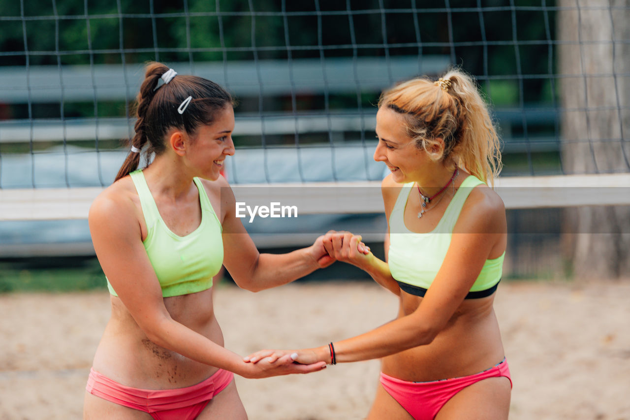 Beach volleyball players won game