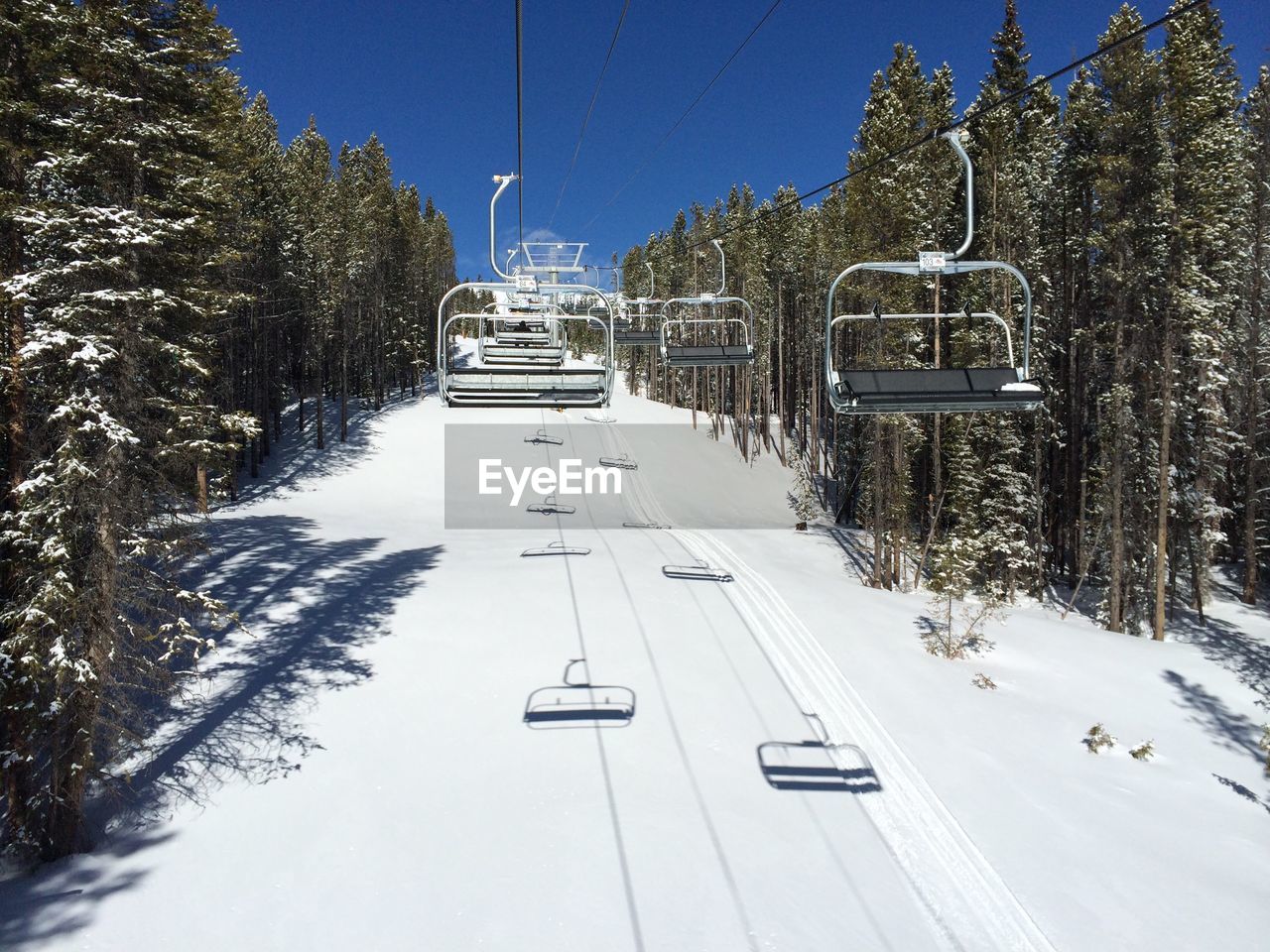 Ski lift against sky