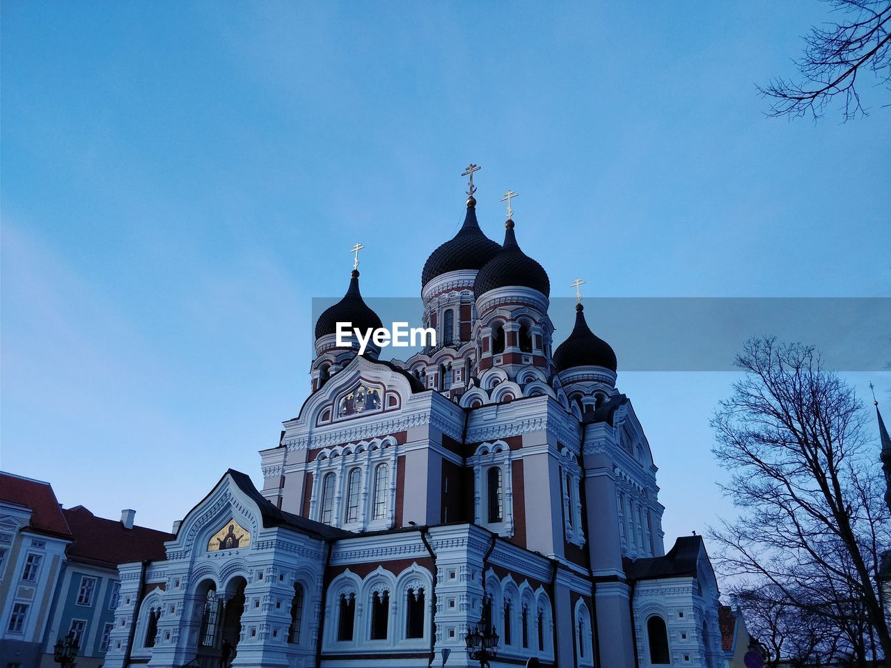 Low angle view of cathedral against blue sky at dusk