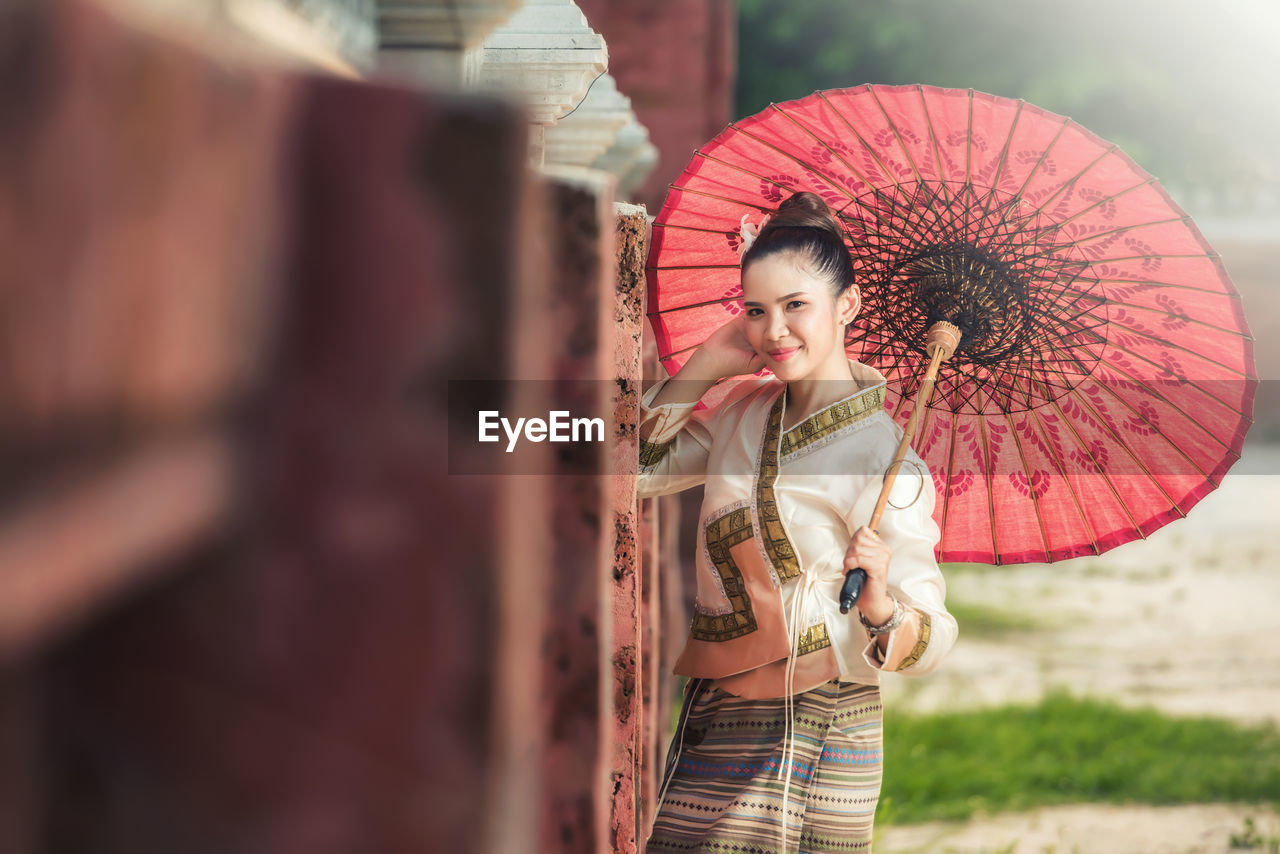 Thai woman in traditional costume of thailand