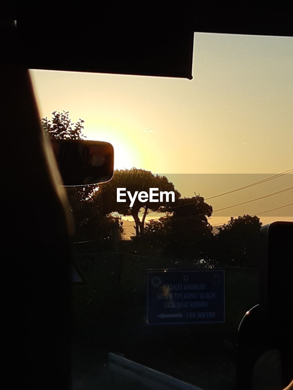 INFORMATION SIGN IN CAR AGAINST SKY