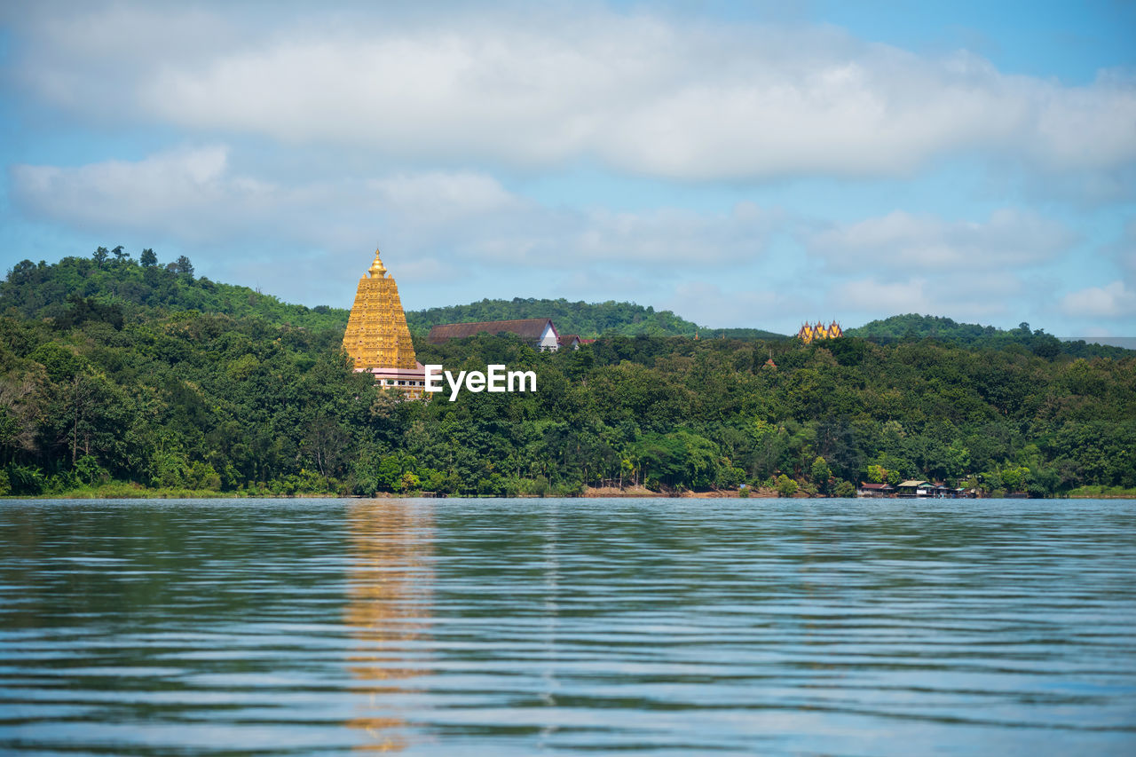 SCENIC VIEW OF LAKE AGAINST TREES