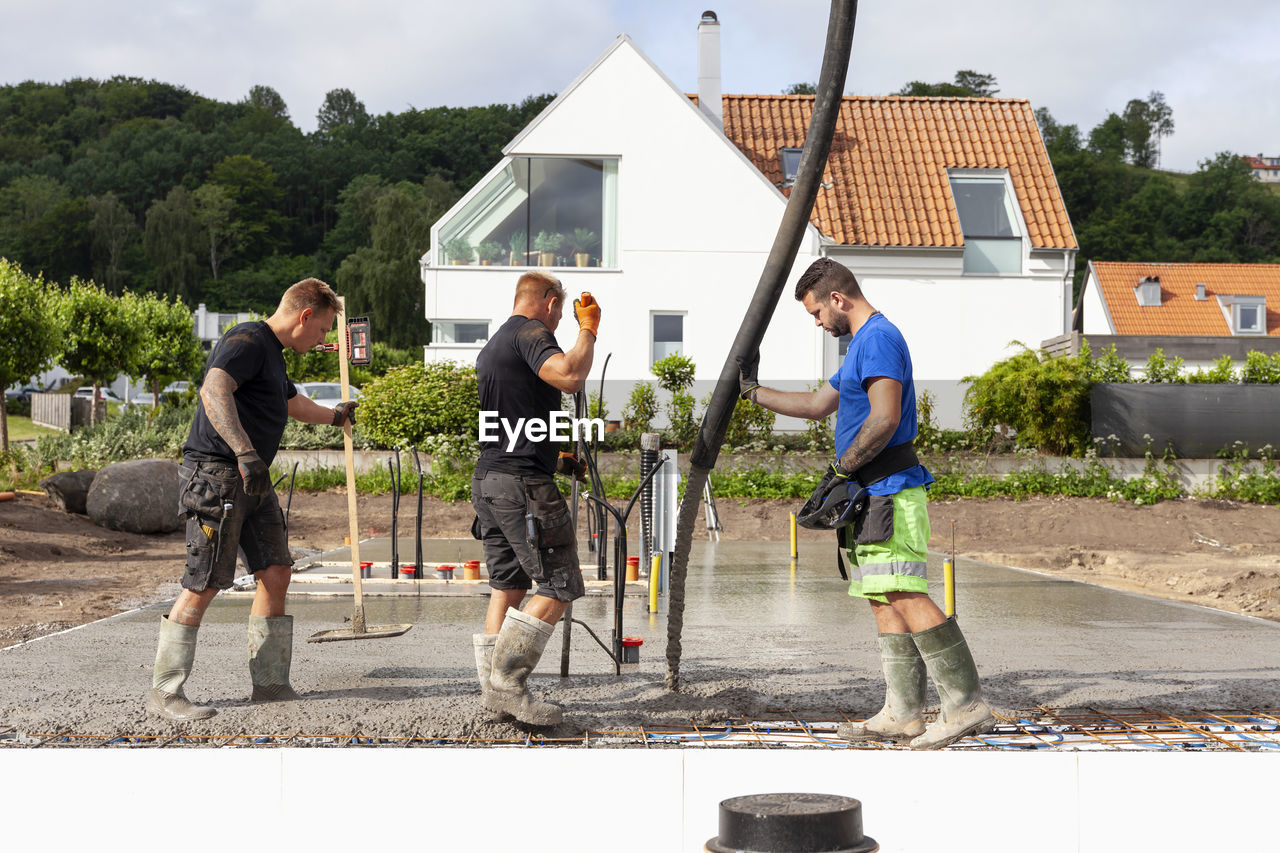 Workers preparing foundations