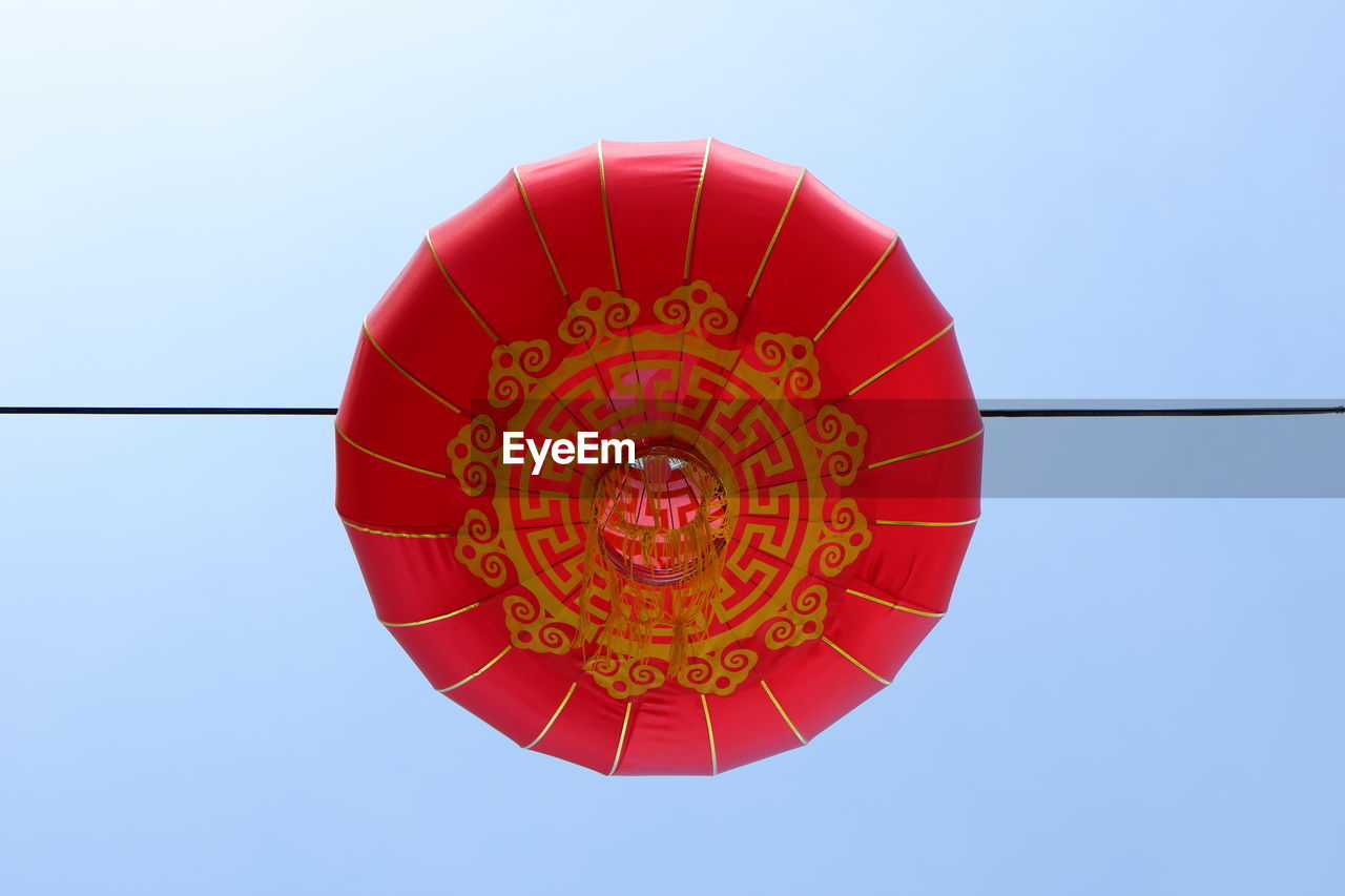 LOW ANGLE VIEW OF LANTERN AGAINST SKY