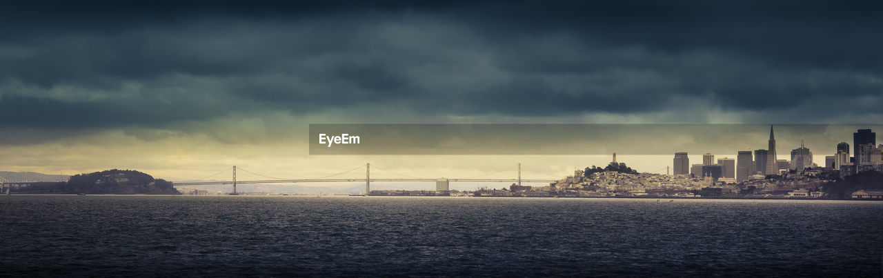 VIEW OF SUSPENSION BRIDGE OVER SEA