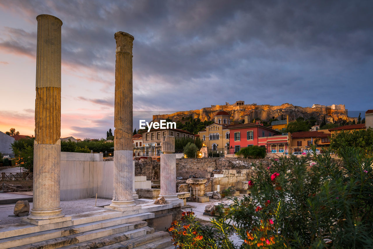 Remains of hadrian's library and acropolis in the old town of athens.