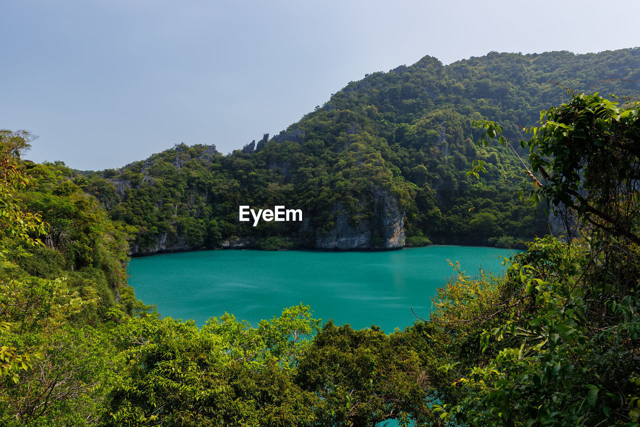 scenic view of sea against mountain