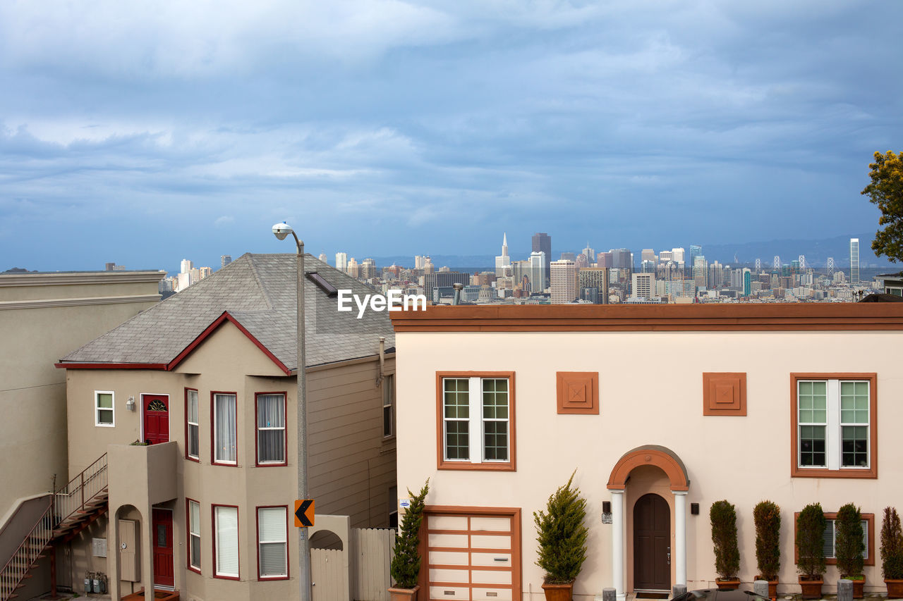 San francisco, california, united states - houses on twin peaks neighborhood and downtown skyline.