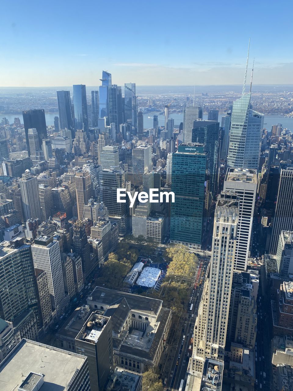 aerial photography, skyscraper, architecture, building exterior, built structure, urban area, cityscape, metropolis, city, blue, aerial view, building, high angle view, no people, tower, skyline, nature, office building exterior, metropolitan area, day, tower block, landmark, outdoors, reflection, residential district, downtown, sky, industry, sunlight