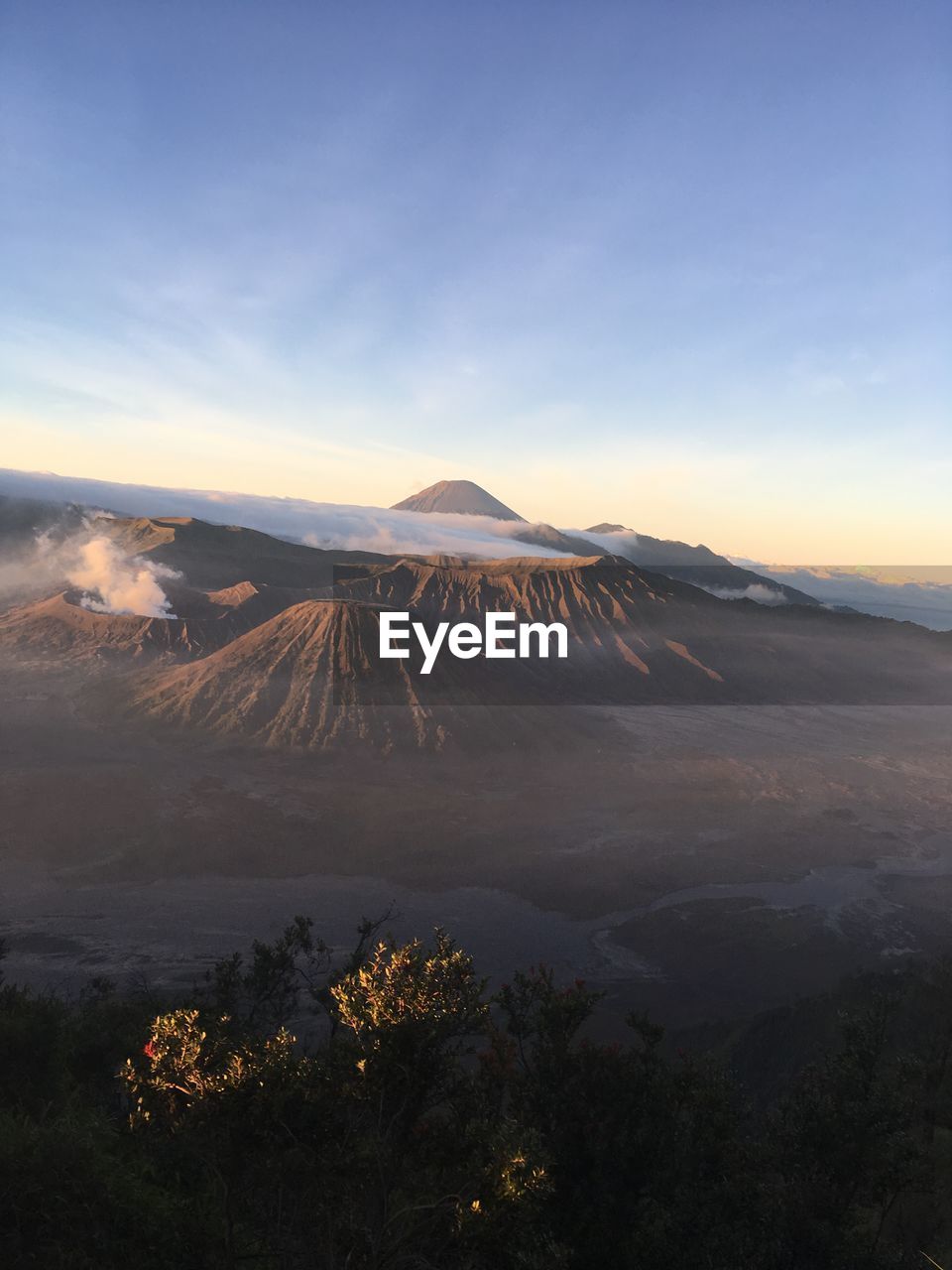 SCENIC VIEW OF SNOWCAPPED MOUNTAINS AGAINST SKY DURING SUNSET