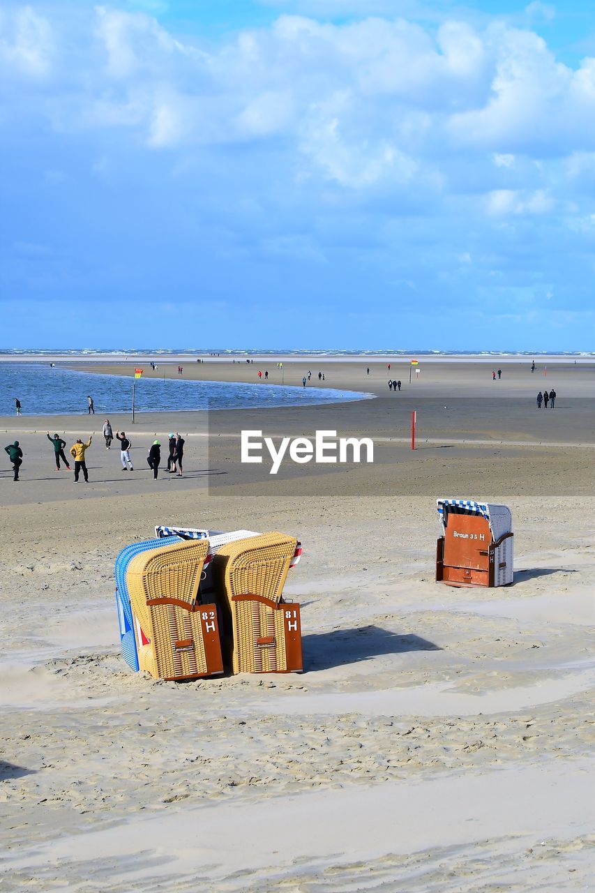 HOODED CHAIRS ON BEACH