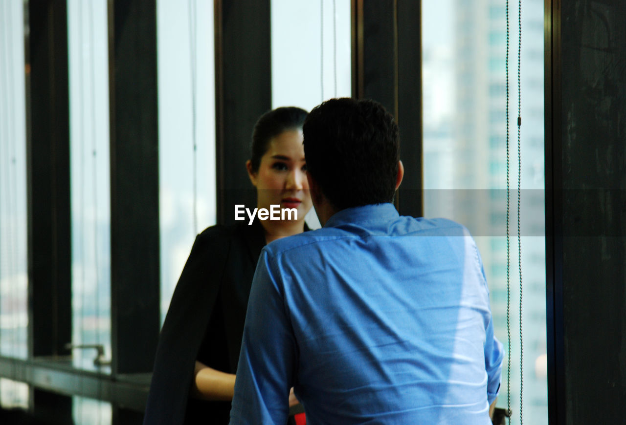Colleagues working in office