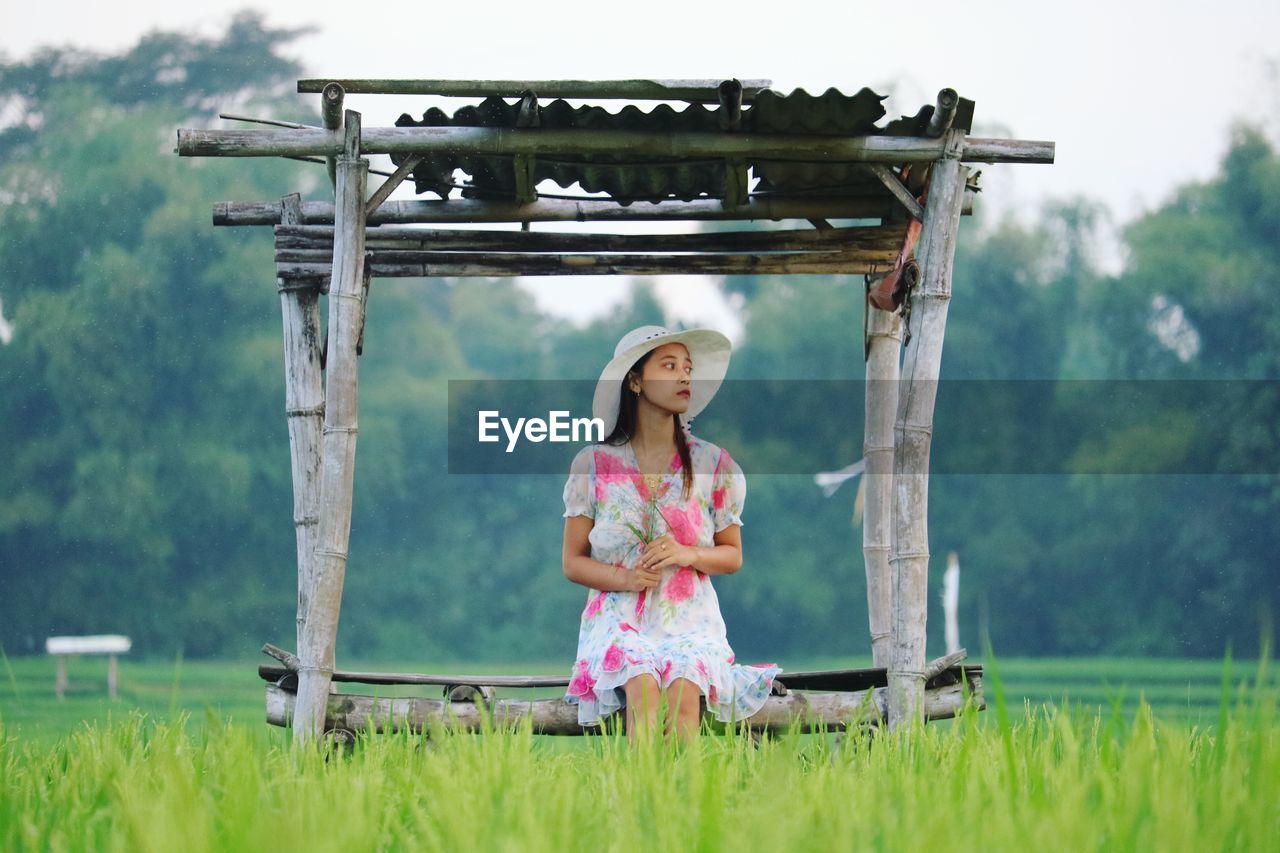 Full length of girl standing on field