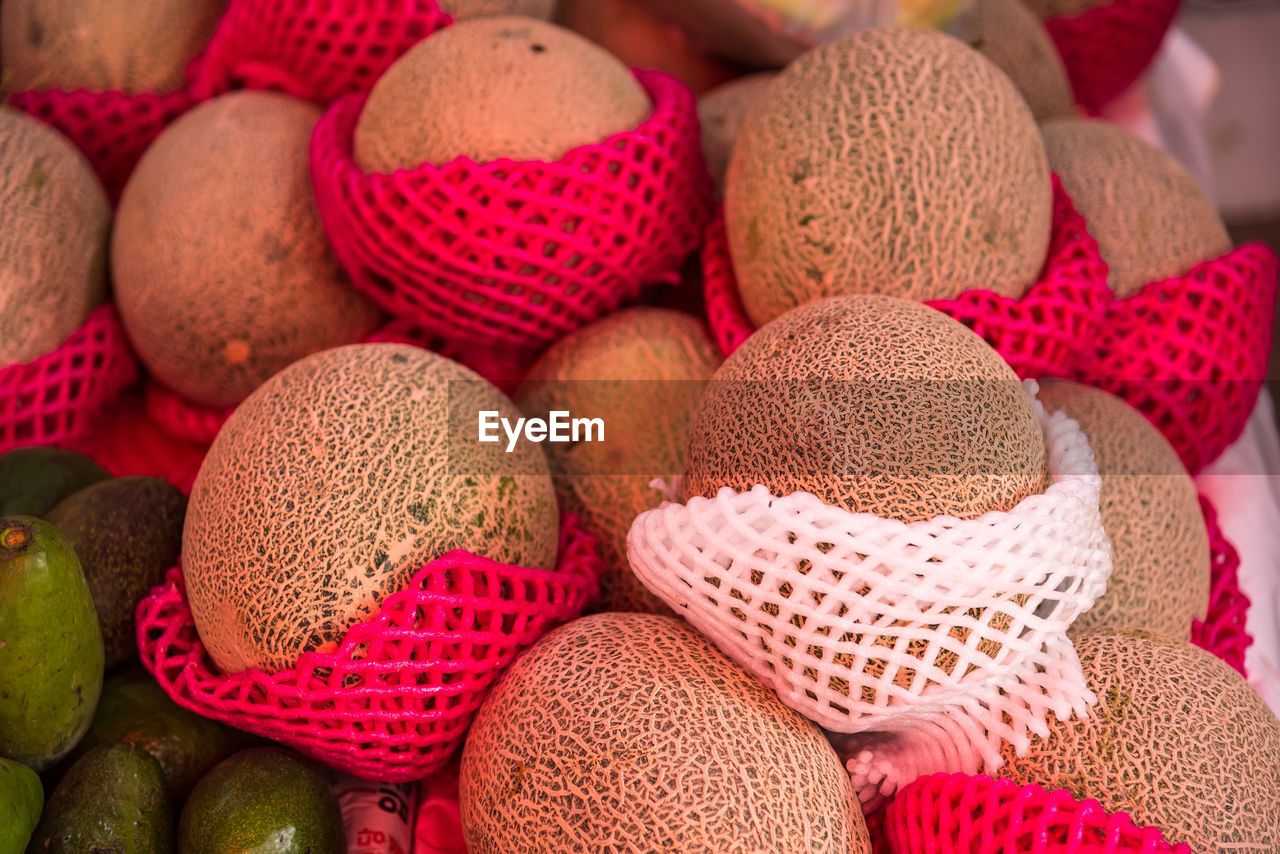 CLOSE-UP HIGH ANGLE VIEW OF FRUITS ON DISPLAY AT HOME