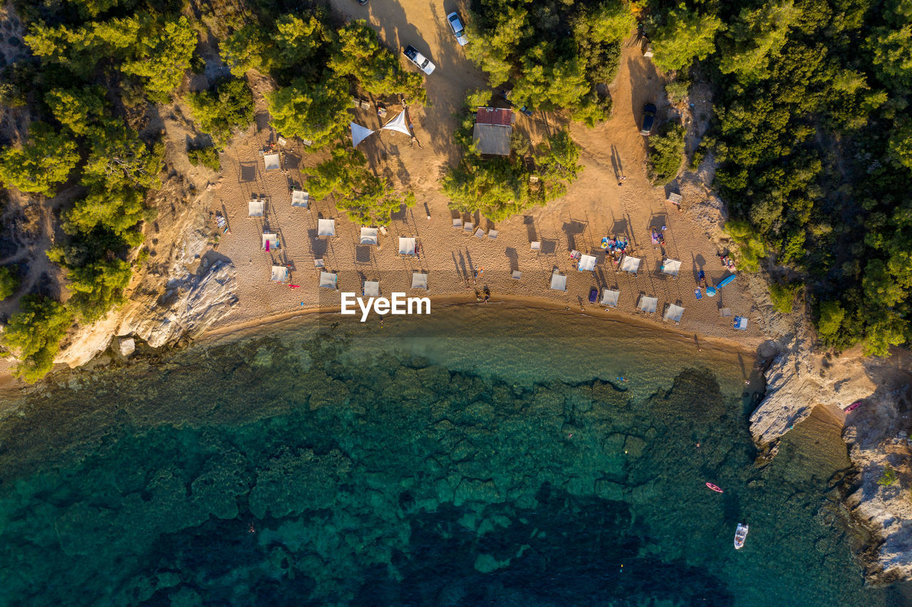 HIGH ANGLE VIEW OF SWIMMING POOL AT RESORT