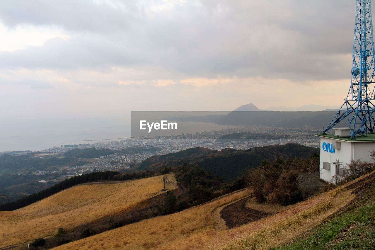 PANORAMIC VIEW OF LANDSCAPE AND BUILDINGS AGAINST SKY